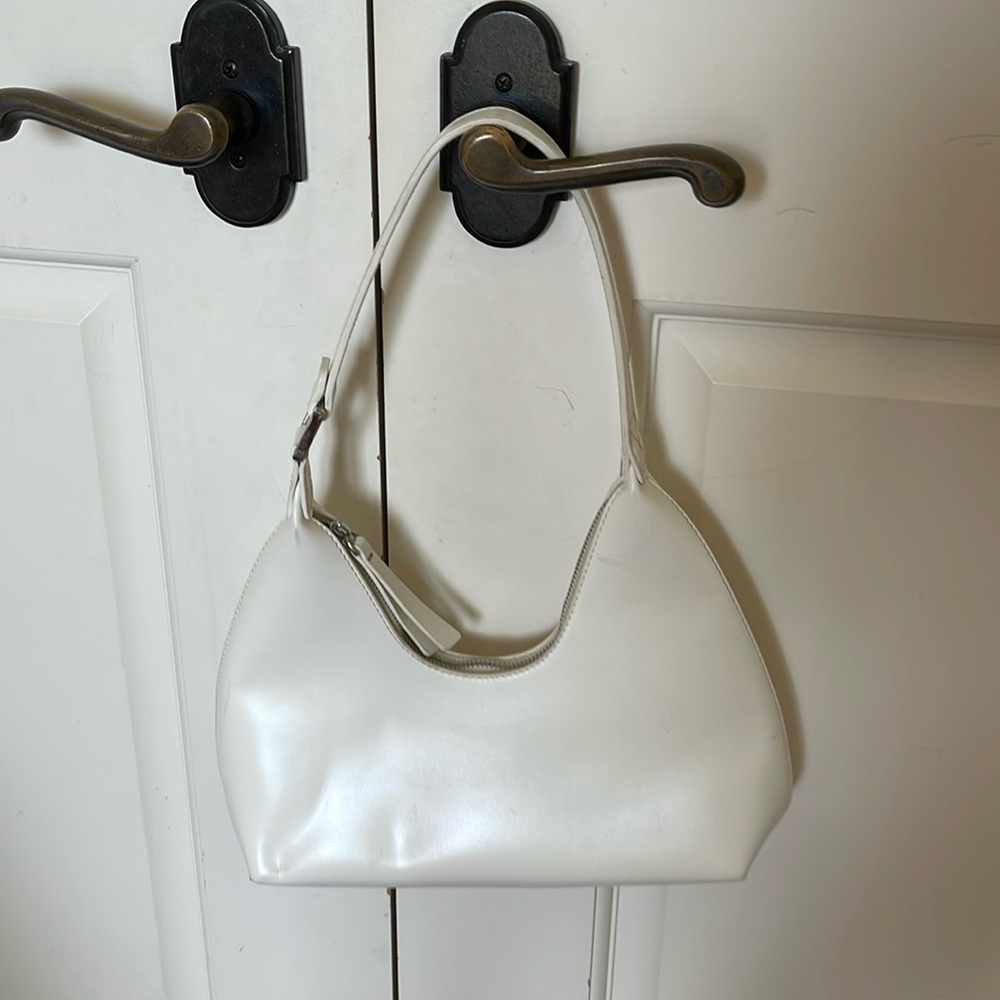 white purse (shoulder bag)